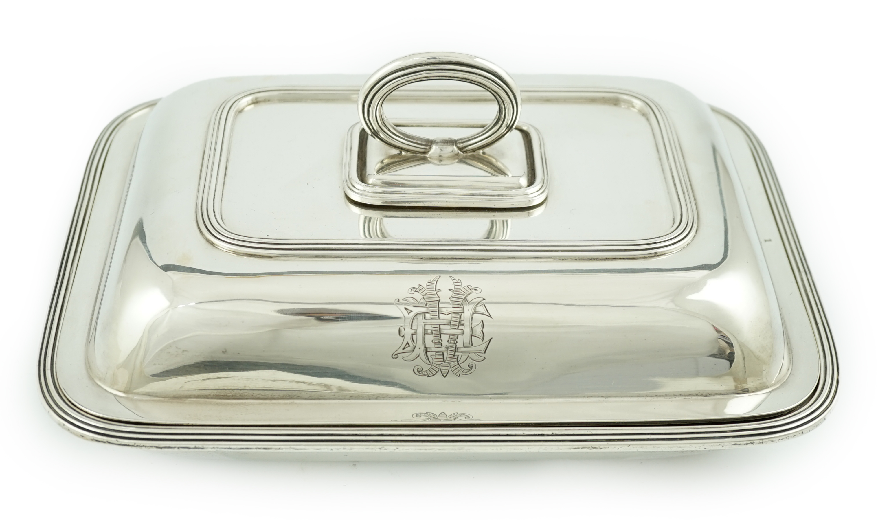 A George V silver entree dish and cover with handle, by Sebastian Garrard